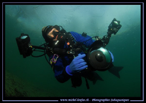 This sunday dive... My good old friend Sven under the ice... by Michel Lonfat 